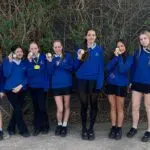 Some of the team showing off their gold medal bling!